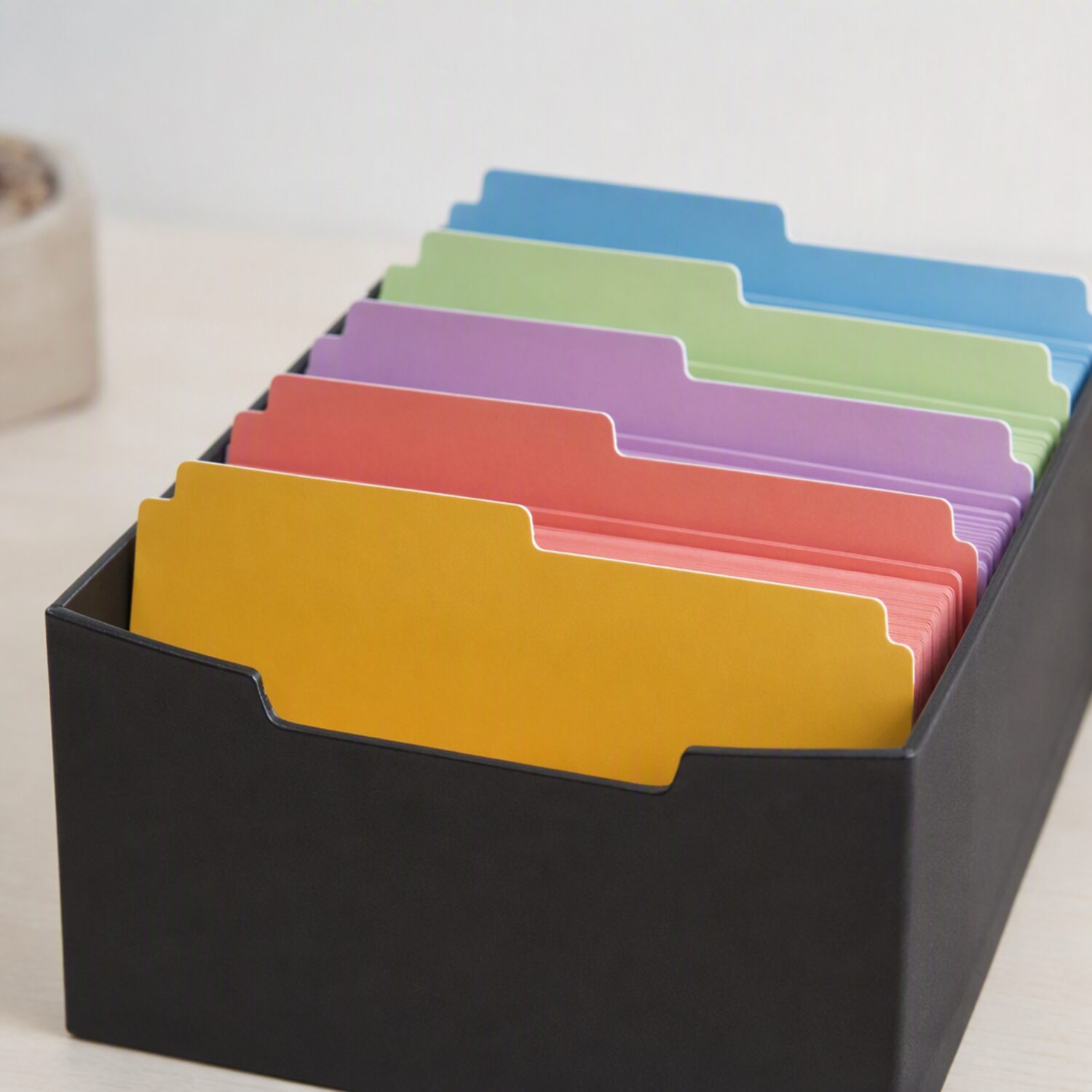 Coloured dividers in a card file box