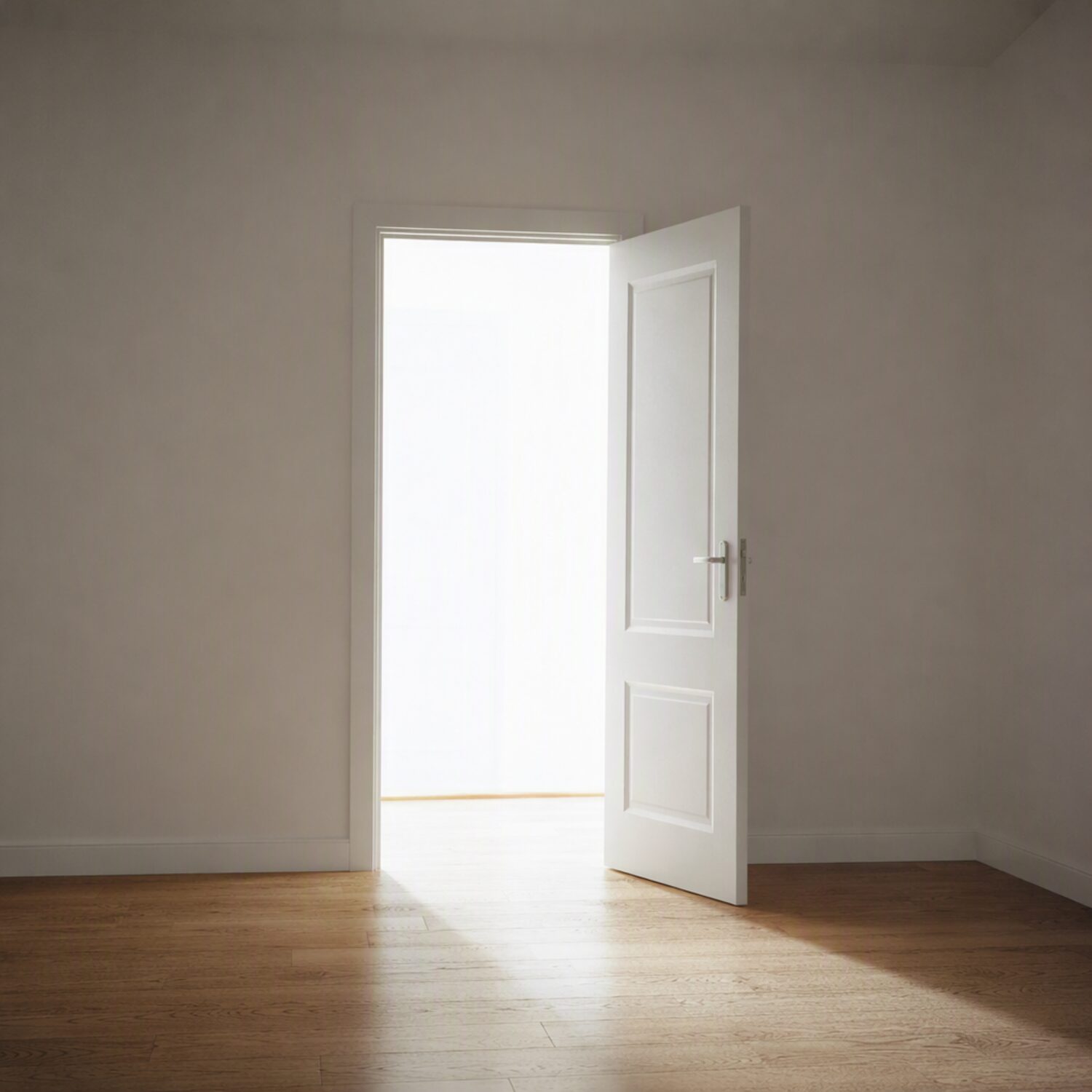 An open door with daylight on a wooden floor