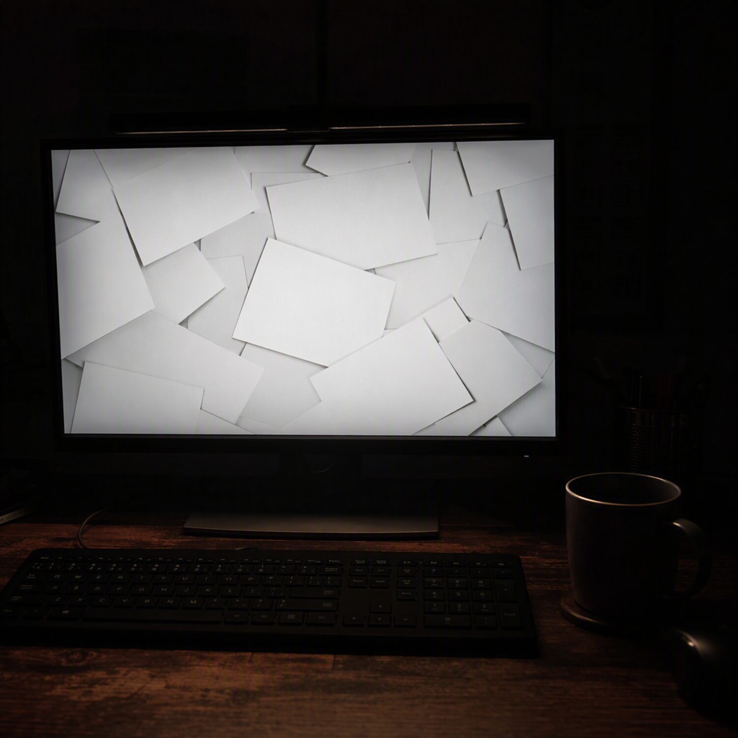 A monitor showing an abstract feed of cards